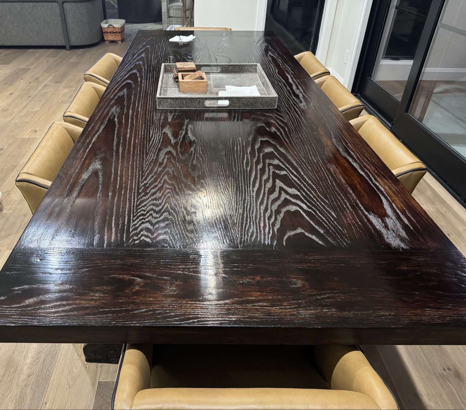 Cerused oak dining table with leather chairs