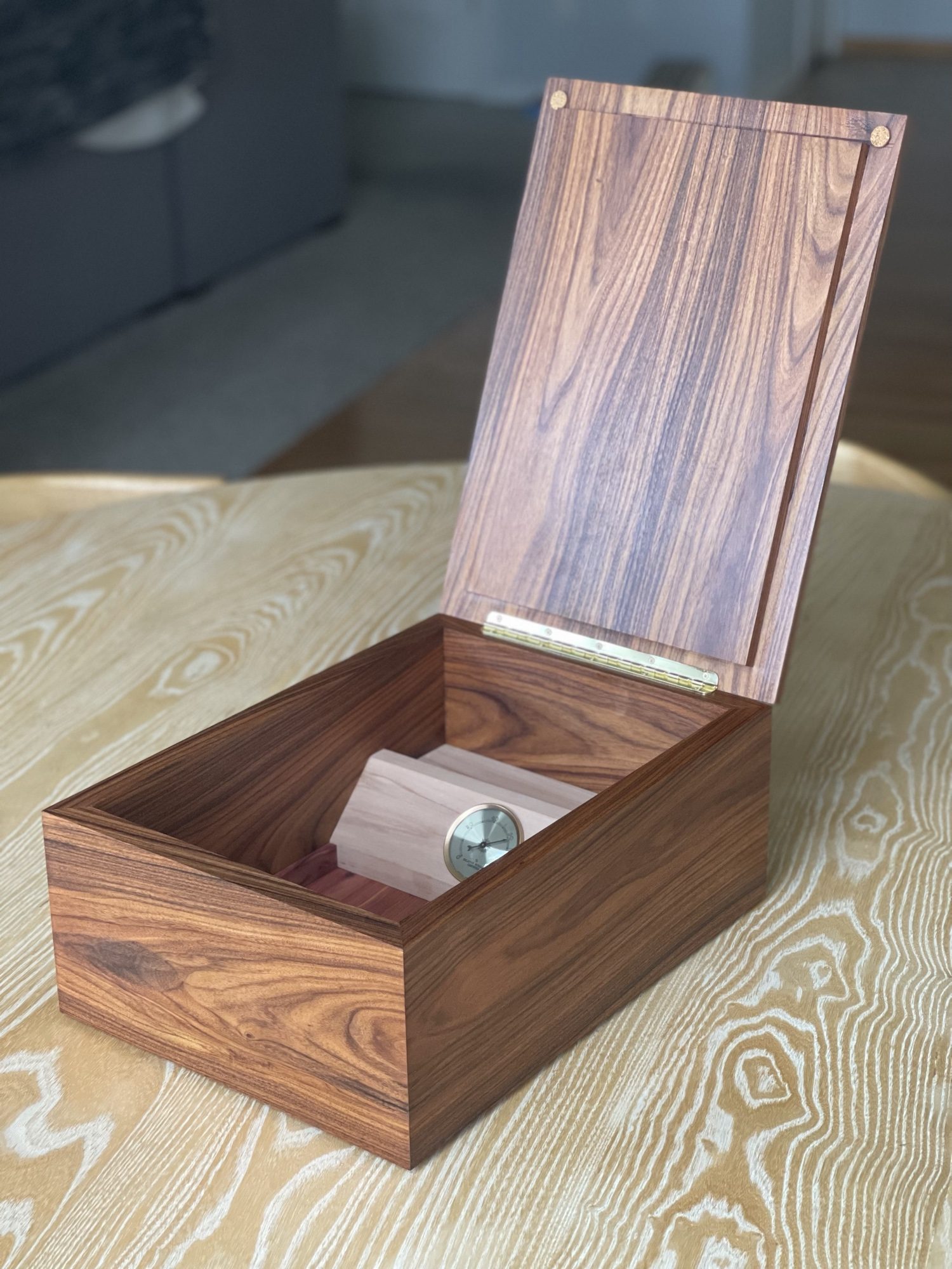 Walnut humidor box, open with hygrometer